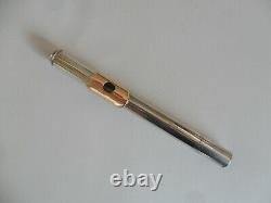Wm S Haynes silver flute with 14K gold lip plate and 3 foot joints B, C & D